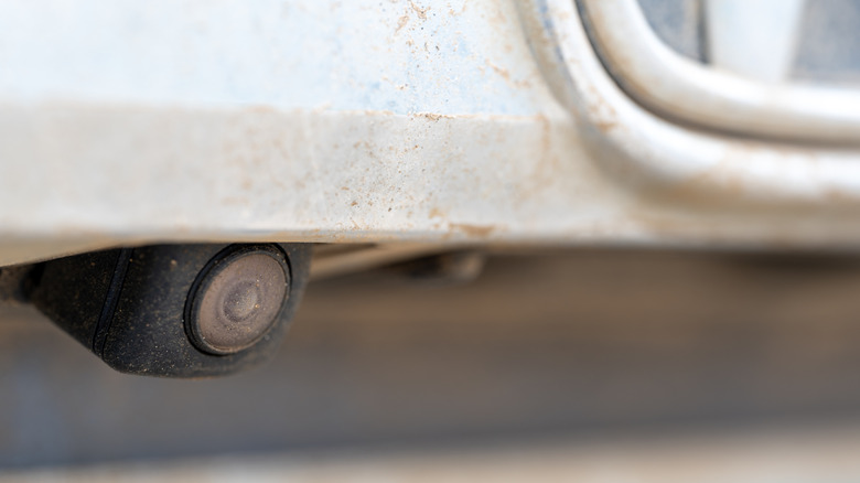 Close up of rearview camera lens