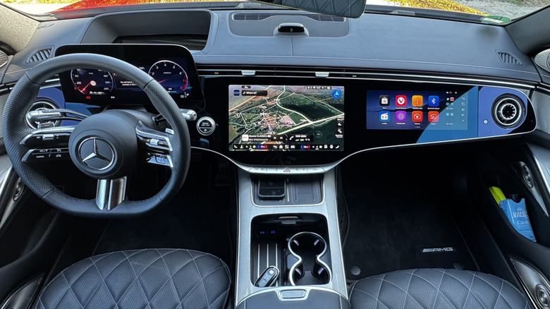 a look down at the dashboard in the new S-Class showing its three screens and lack of buttons